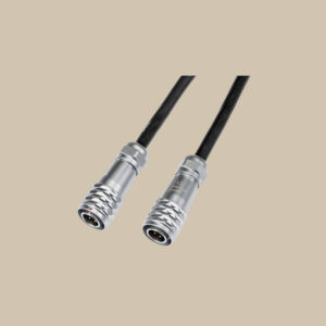 Två svarta Power Link DC-kablar med snygga, räfflade silverkontakter, redo att användas - perfekt för ljud- eller utrustningskopplingar.