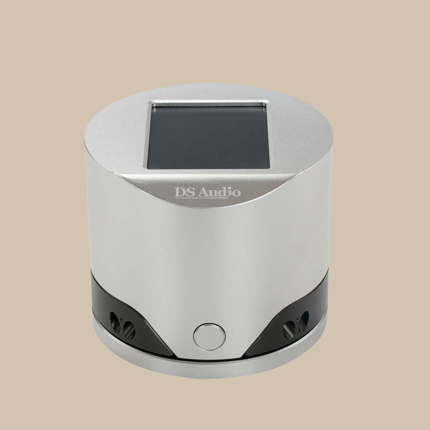 En elegant, silverfärgad ES-001-enhet - tänk modern förstärkarkänsla - med en display på ovansidan och en knapp på framsidan, mot en beige bakgrund.