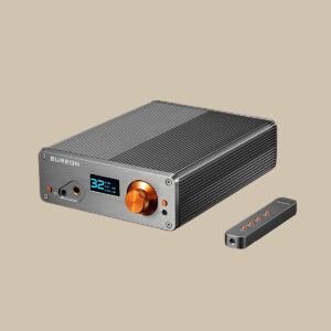Burson Audio Playmate 3 glänser med sin silverfinish, livfulla orange volymknapp och fjärrkontroll som är redo att förstärka varje ton.